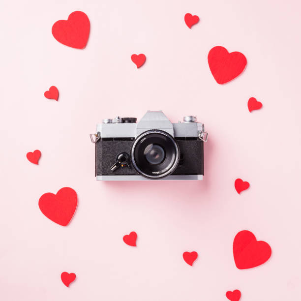 istock retro camera and red hearts composition greeting card 1297330511