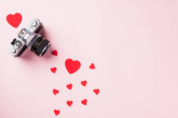 istock retro camera and red hearts composition greeting card 1297330571