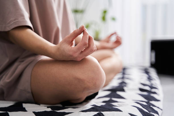 istock Girl sitting cross-legged 1297331835