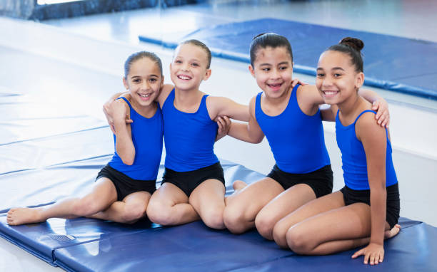 istock Four girls in gymnastics class 1297334667
