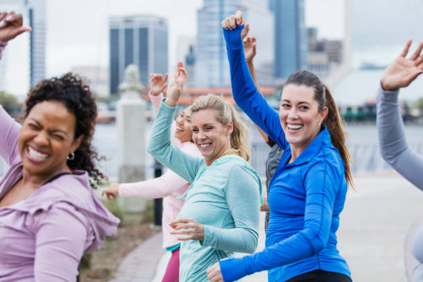 istock Hispanic woman in group dance class 1297334734