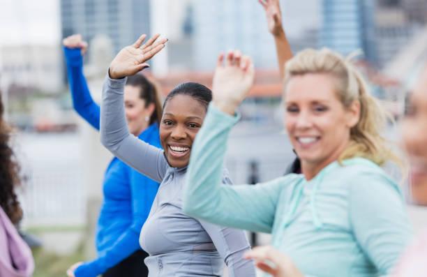 istock African-American woman in group exercise class 1297335340