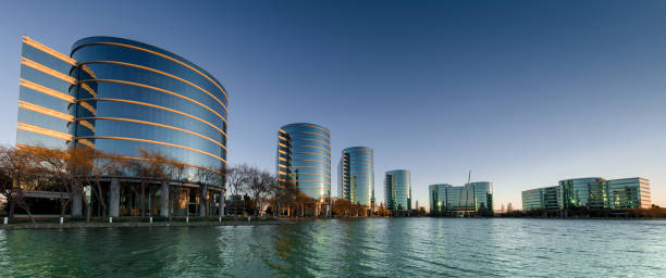 Sunrise over Oracle Software Company Buildings in Silicon Valley in Redwood Shore, California Redwood Shores, California - January 19, 2021: Sunrise over Oracle Software Company Buildings in Silicon Valley. oracle building stock pictures, royalty-free photos & images