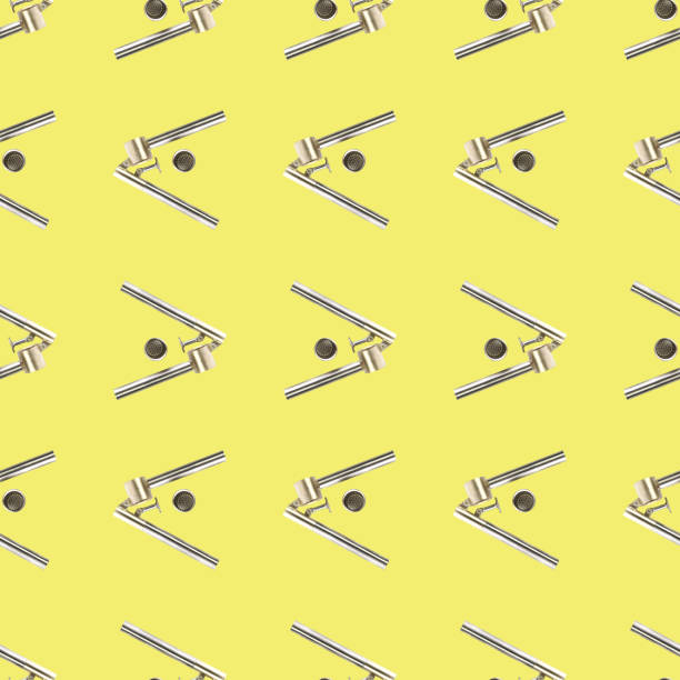 istock Seamless pattern from garlic press isolated on yellow flat lay 1297340553