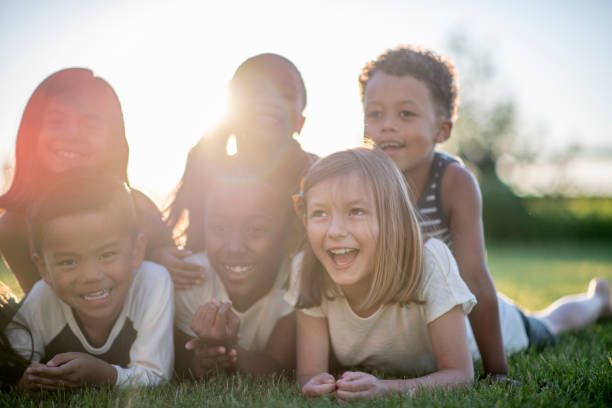 istock Multi ethnic children outdoors 1297340717