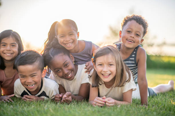 istock Multi ethnic children outdoors 1297340720