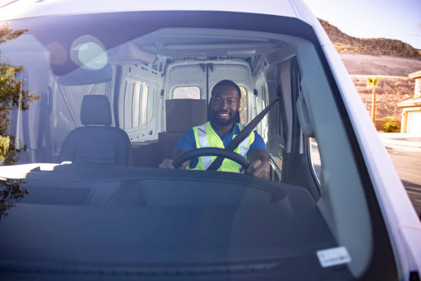 Delivery Rider Behind Lorry 8,900+ Delivery Van Driver Stock Photos, Pictures & Royalty-Free Images ...