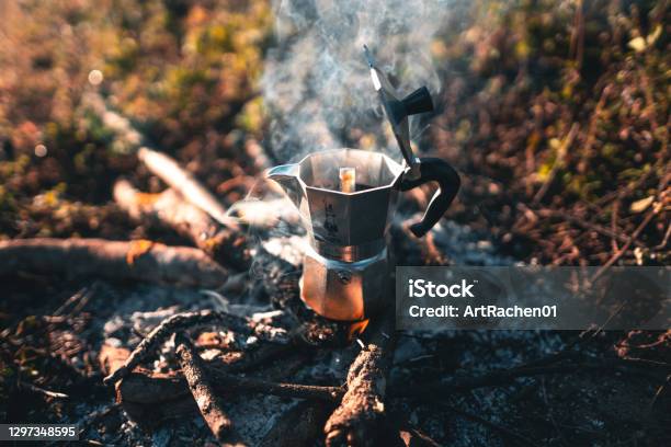 https://media.istockphoto.com/id/1297348595/photo/coffee-in-a-moka-pot-on-a-camping-fire-in-the-morning.jpg?s=612x612&w=is&k=20&c=T-ALsFYR41Up4zWG8EQMxNHMiepHMpExldZpUnYqdP0=