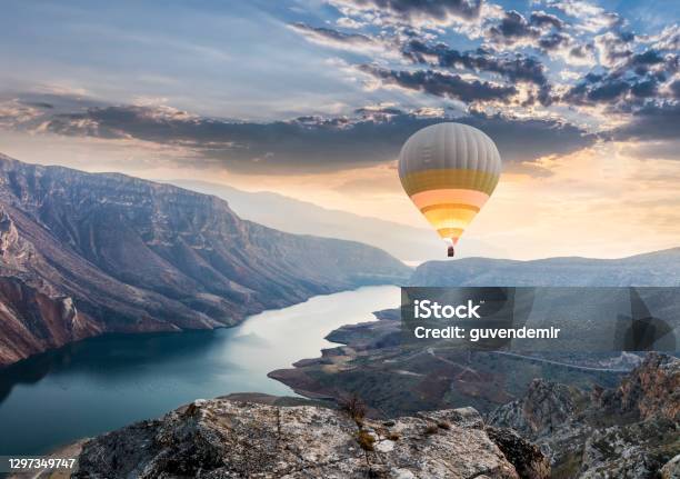 Hot Air Balloons Flying Over The Botan Canyon In Turkey Stock Photo - Download Image Now
