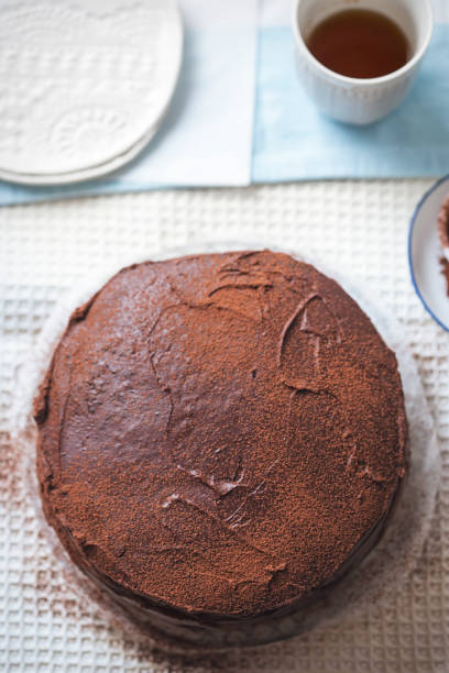 istock Chocolate layered cake. Dark chocolate cake made on buttermilk and cola 1297355196