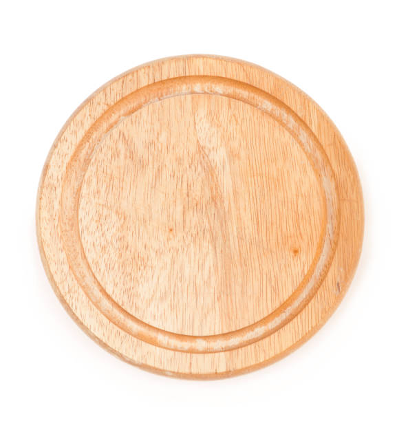 istock Wooden cheese board, isolated on white background 1297355221
