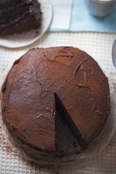 istock Chocolate layered cake. Dark chocolate cake made on buttermilk and cola 1297355247