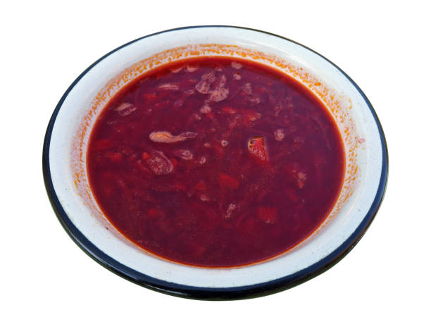 istock Red fat rural soup in a metal  plate. Isolated 1297357874