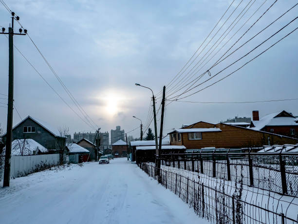 istock suburban landscape in winter during a snowfall 1297357946