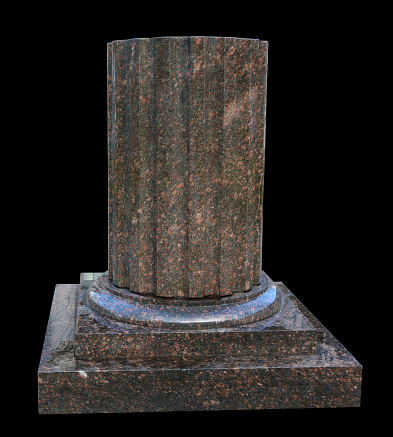 Base of the  granite column. Isolated on black