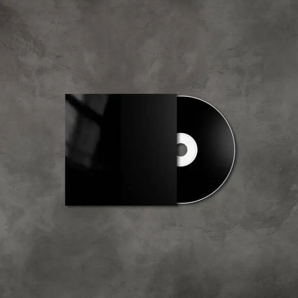 Black CD - DVD label and cover mockup template isolated on concrete background