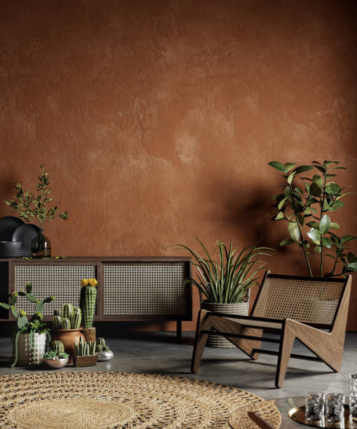 terracotta color interior with plants, dresser, armchair and decor. - showcase interior imagens e fotografias de stock