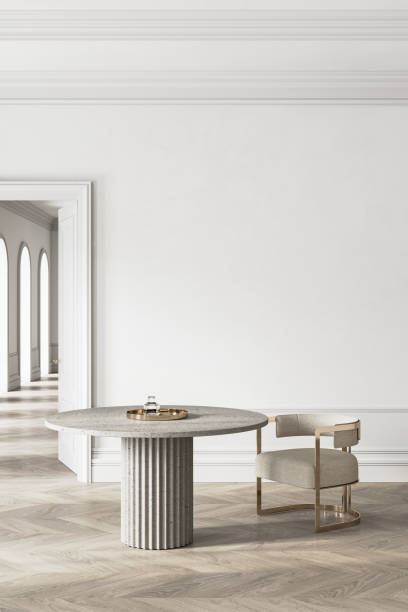 White classic interior with round table, chair and moldings.
