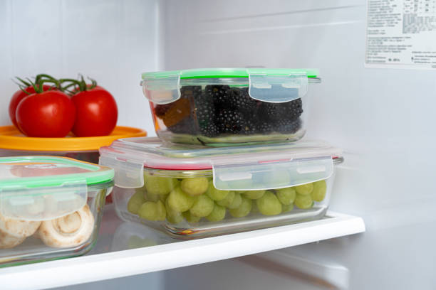 istock Storage containers with fresh food in a fridge 1297367912