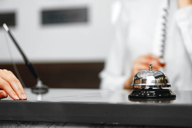 istock Hotel service bell on front desk counter 1297368368