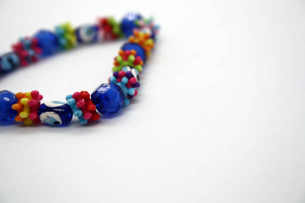 istock A bracelet made of beads on a white background. 1297370476