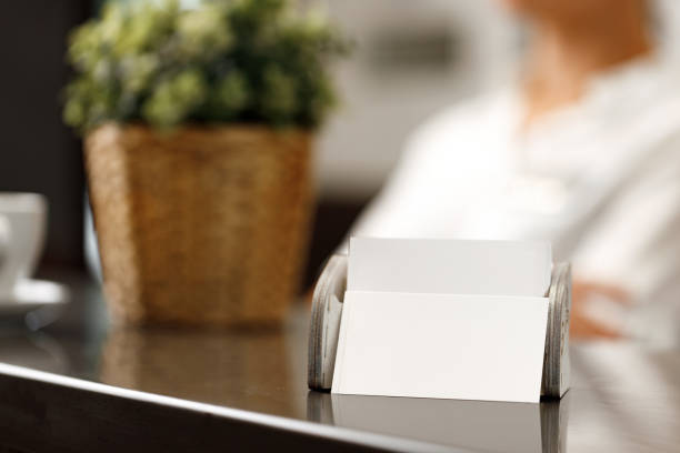 istock Close up of modern hotel reception counter desk 1297370876