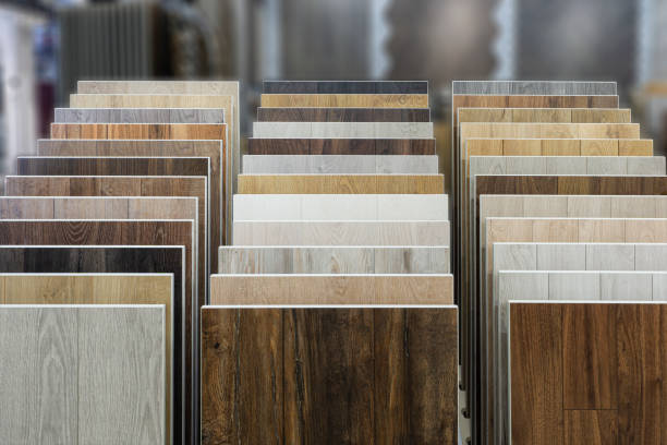 istock Laminate background. Samples of laminate or parquet with a pattern and wood texture for flooring and interior design. Production of wooden floors 1297370885