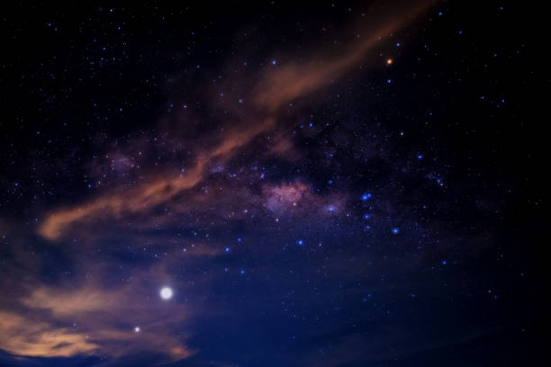 istock Many stars on dark night with noise , White clouds obscured and disturbed. 1297372119