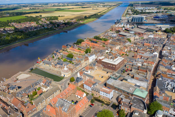 Aerial photo of the beautiful town of King's Lynn a seaport and market town in Norfolk, England UK showing the main town centre along side the River Great Ouse on a sunny summers day stock photo