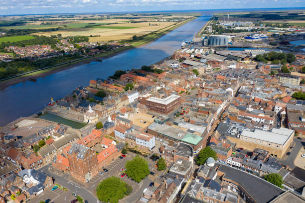 Aerial photo of the beautiful town of King's Lynn a seaport and market town in Norfolk, England UK showing the main town centre along side the River Great Ouse on a sunny summers day Aerial photo of the beautiful town of King's Lynn a seaport and market town in Norfolk, England UK showing the main town centre along side the River Great Ouse on a sunny summers day kings lynn stock pictures, royalty-free photos & images