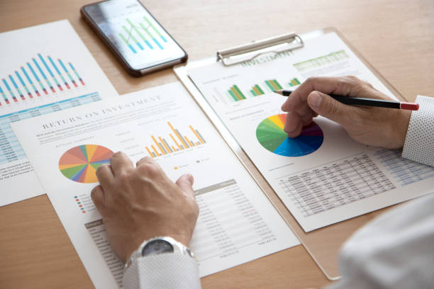 istock Reviewing business performance and investment analysis 1297374642