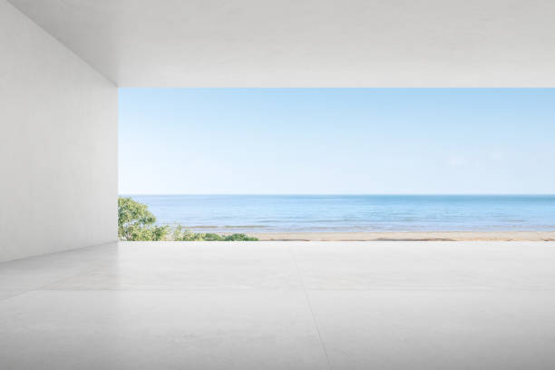 istock 3d render of empty concrete room with large window on the sea background. 1297374643