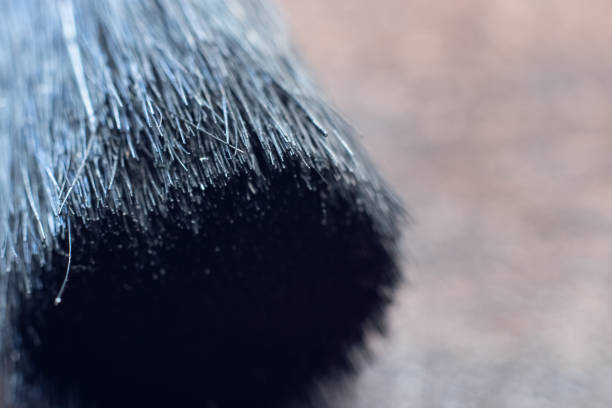 istock Black pile makeup brushes macro photo closeup 1297375085