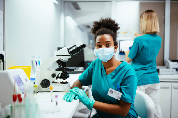 istock Female researchers working in laboratory, finding cure for covid-19 1297375102