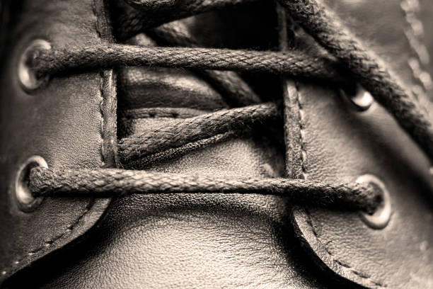 istock Laces on black men's boots close up 1297375815
