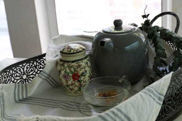 istock Chamomile Tea in the afternoon by the window 1297376179