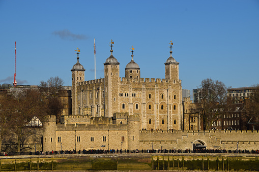 Daytime view of the Tower of London on the river Thames (England).