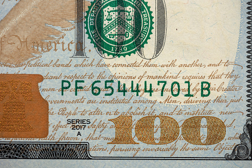 closeup of 100 dollar bill financial concept