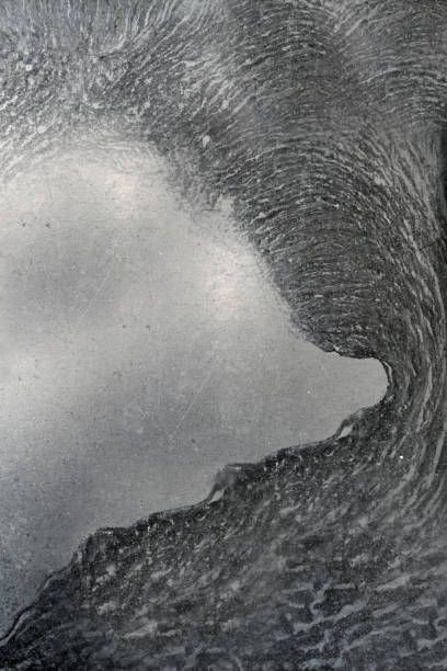 istock The texture of a gray concrete wall with scratches and wave streaks on the surface 1297384621
