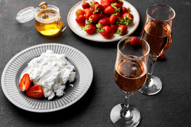 istock Cream cheese and fresh strawberries on black background 1297384637