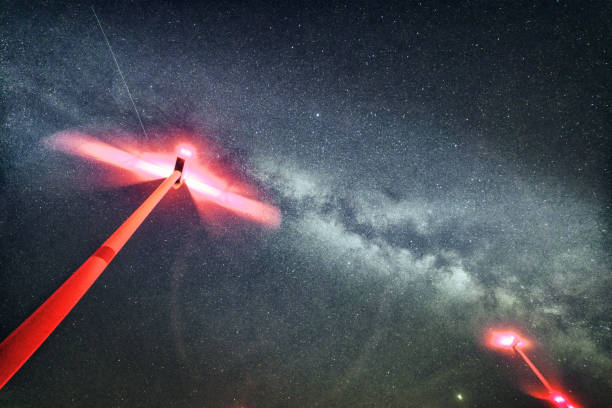 istock winturbines under milkyway star-clusterat night 1297385550