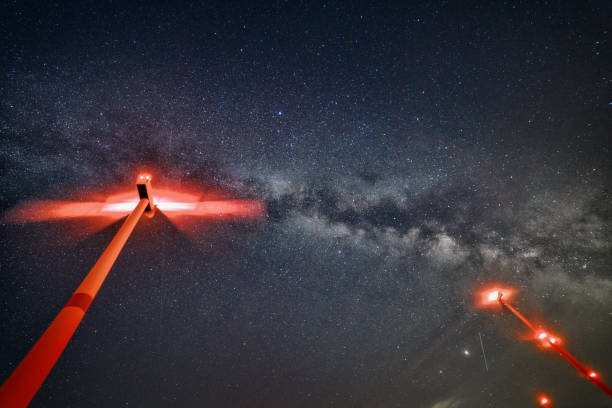 istock winturbines under milkyway star-clusterat night 1297385723