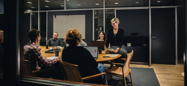 istock Diverse business team having a meeting in boardroom 1297388028