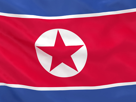 Close-up of the flag of North Korea on satin texture.