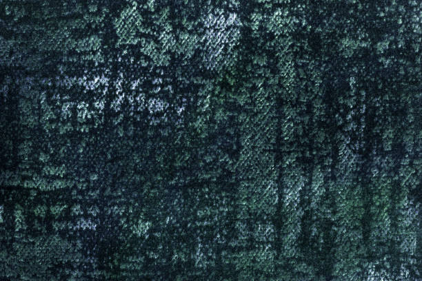 istock Dark green and blue fluffy background of soft, fleecy fabric. 1297391224