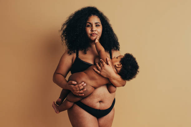 istock Mother breastfeeding her baby 1297391828