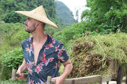 Caucasian man in rural Asian village