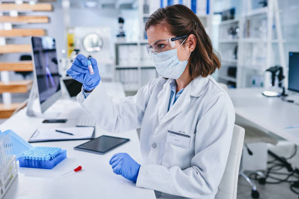 The pro in sample processing Shot of a scientist conducting medical research in a laboratory antibody test stock pictures, royalty-free photos & images