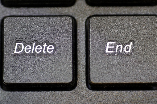 Macro close up of the Delete and End buttons on a personal computer keyboard