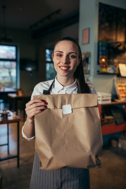 istock waitress in cafe or restaurant 1297395930